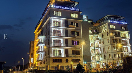 THE WELLS CARLTON HOTEL