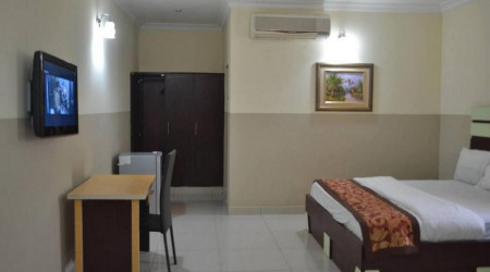 Joy House Hotel And Suites